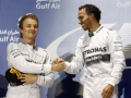 Bahrain International Circuit, Sakhir, Bahrain.
Sunday 06 April 2014.
Nico Rosberg, Mercedes AMG and Lewis Hamilton, Mercedes W05 celebrate on the podium.
World Copyright: Alastair Staley/LAT Photographic.
ref: Digital Image _R6T4480.JPG