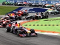 MONZA, ITALY - SEPTEMBER 08:  Sebastian Vettel of Germany and Infiniti Red Bull Racing leads through the first corner at the start of the the Italian Formula One Grand Prix at Autodromo di Monza on September 8, 2013 in Monza, Italy.  (Photo by Mark Thompson/Getty Images)