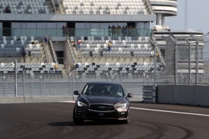 84826_Sebastian Vettel laps Sochi GP circuit in an Infiniti Q50