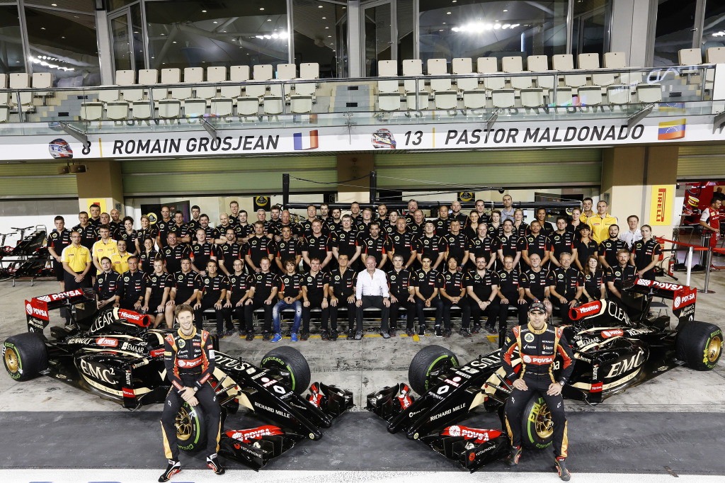 Yas Marina Circuit, Abu Dhabi, United Arab Emirates. Saturday 22 November 2014. Romain Grosjean, Lotus F1, Pastor Maldonado, Lotus F1, Federico Gastaldi, Deputy Team Principal, Lotus F1, Nick Chester, Technical Director, Lotus F1, Charles Pic, Reserve Driver, Lotus F1 Team, Alan Permane, Trackside Operations Director, Lotus F1, Ayao Komatsu, Race Engineer, Lotus F1, Paul Seaby, Team Manager, Lotus F1, Esteban Ocon, Lotus F1, in the Lotus F1 Team Shot. World Copyright: Alastair Staley/Lotus F1. ref: Digital Image _79P9579