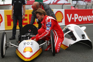 Nick-Heidfeld-is-shown-a-Shell-Eco-marathon-vehicle-ahead-of-driving-it-on-track-at-Le-Mans-24-Hours